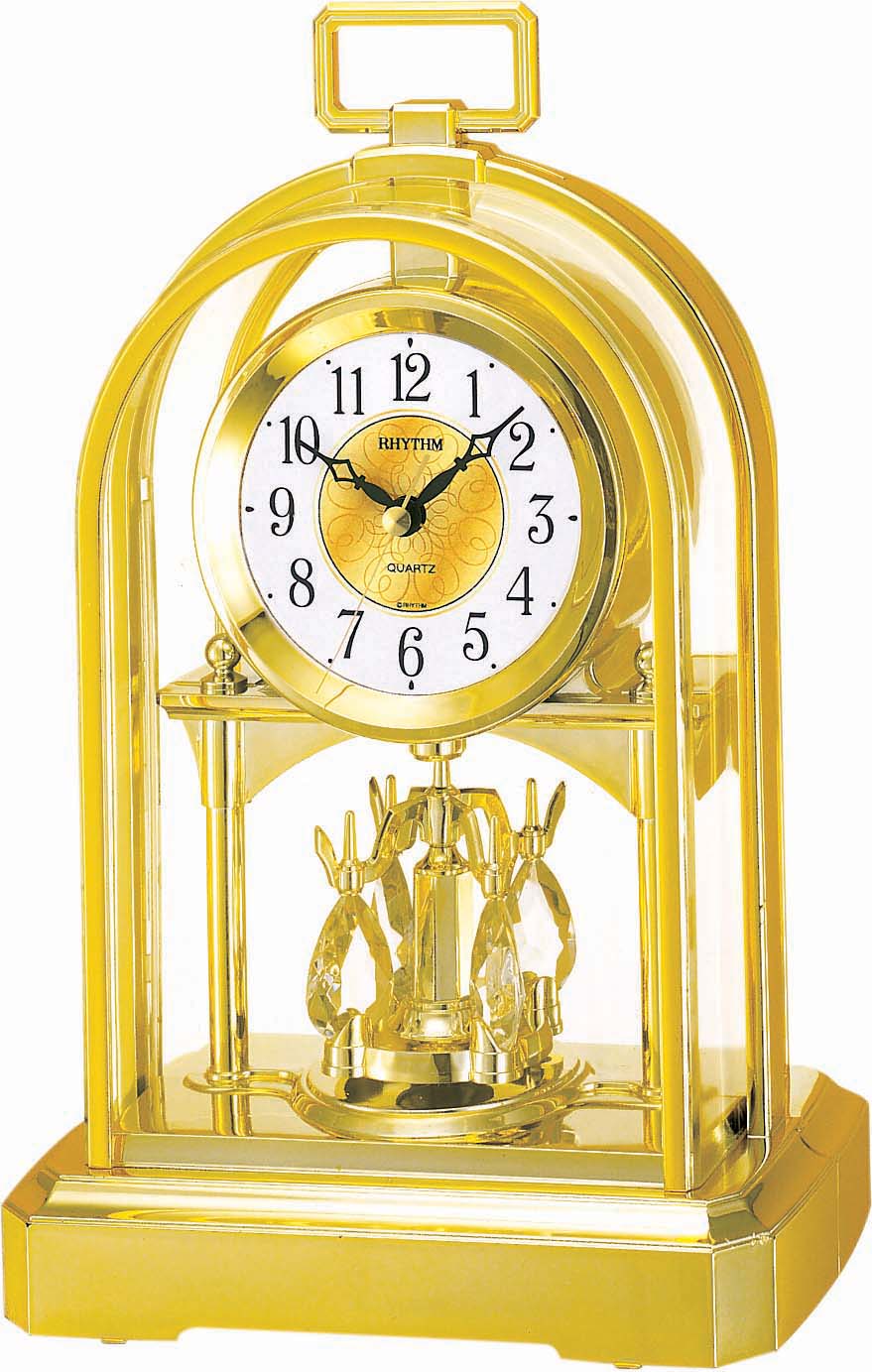 Rhythm 7744/9 gold carriage clock/ table clock quartz