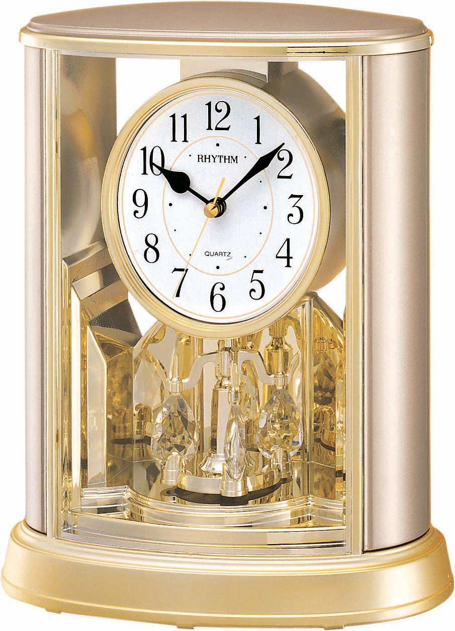 Rhythm 7724/9 gold/champ. carriage clock/ table clock quartz