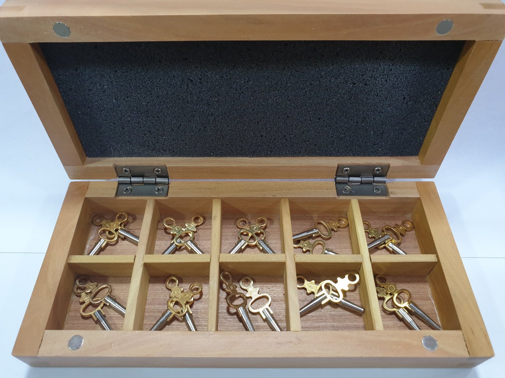Zakhorlogesleutel set in houten kistje